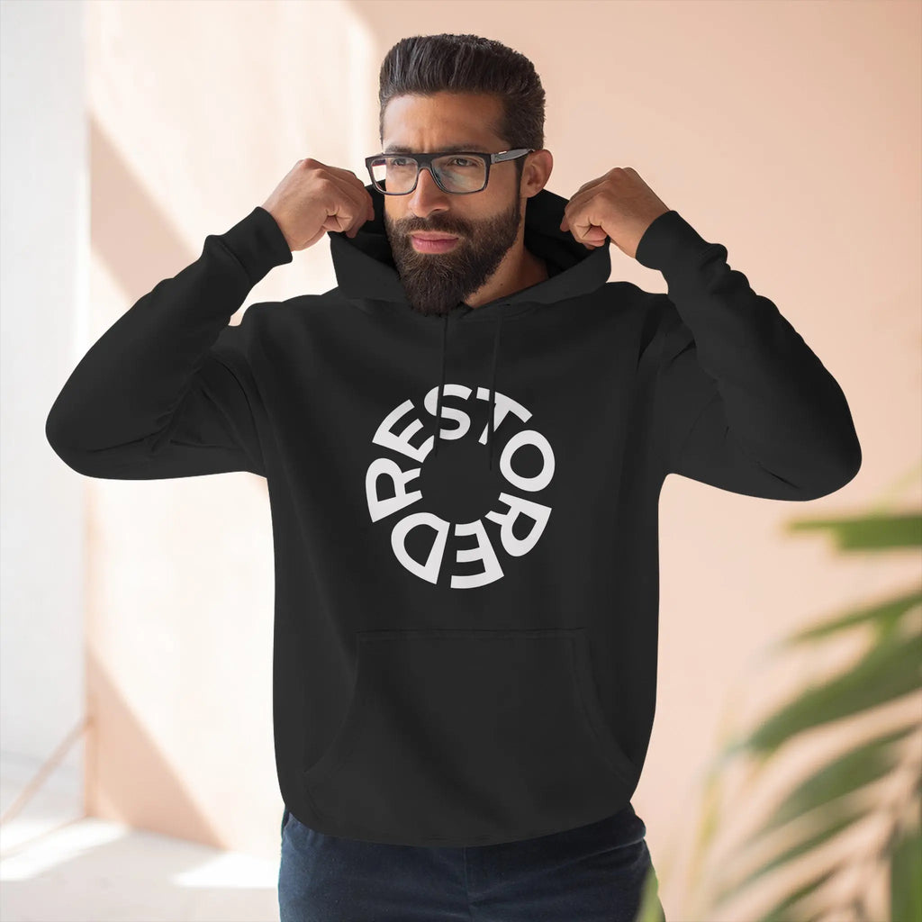 RESTORED black fleece hoodie front view with circular logo